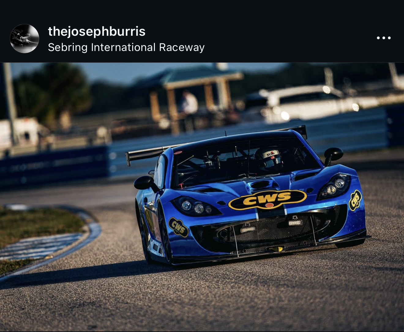 Joseph Burris racing at Sebring International Raceway in the blue CWS car